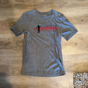 "Golf Sucks" t-shirt by Travis Mathew